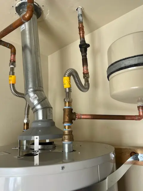 Water heater installation and plumbing repair in Manor